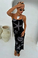 Black Seashell Mesh Cami Dress with white starfish and shell prints, styled with a large silver necklace and sunglasses.
