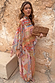 Dolce Vita Cape Top in a pastel patchwork tile print with wide sleeves and a detachable neck scarf.