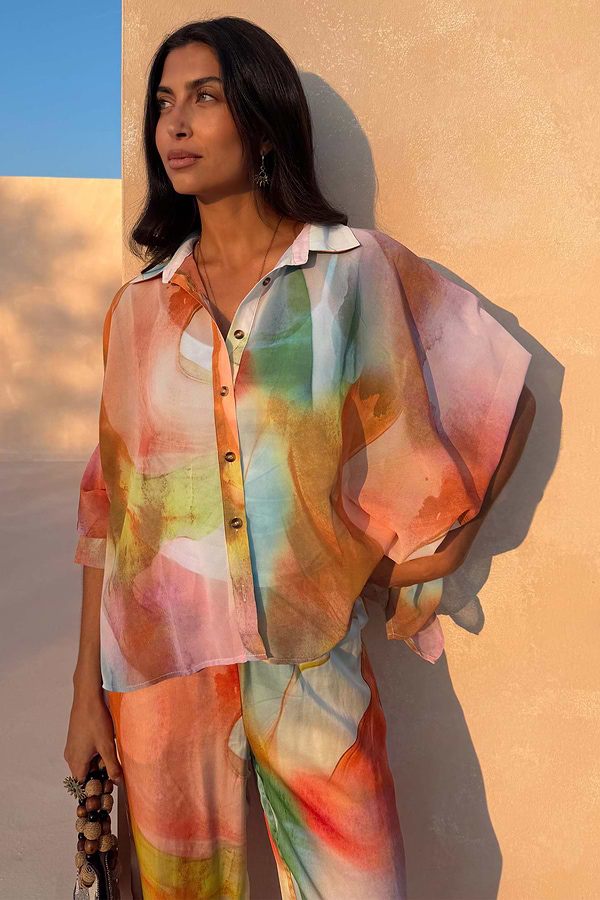 Multicoloured Abstract Cape Shirt with a relaxed oversized fit, button-up front, and wide cape sleeves.
