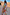 Thumbnail for Multicoloured Abstract Cape Shirt featuring an oversized silhouette and button-up front, paired with matching trousers.