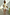 Thumbnail for Cream Celestial Ellie Shorts in a cotton-linen blend with sun and heart motifs, styled on a model.