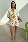 Cream Celestial Ellie Shorts in a cotton-linen blend with sun and heart motifs, styled on a model.