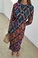 Multi-coloured Check Soho Dress in textured plisse with long sleeves, a cinched tie waist and an ankle-length hem.