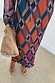 Check Soho Dress in multi-colour autumnal plisse fabric with a bold check print and leopard print strappy sandals.