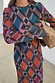 Check Soho Dress in a bold autumnal check print, featuring textured plisse fabric and a matching tie-waist belt.