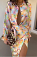 Check Sun Jaspre wrap skirt with sun motifs, styled as a colourful co-ord with the matching shirt.