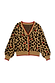Thumbnail for Cherry Leopard Cardigan in an iconic leopard print with red cherry motifs, V-neckline, and contrast red trims.
