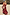Thumbnail for Black Cherry Sarong with a red cherry print and wrap tie waist, worn by a model on a sandy beach vacation.