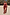 Thumbnail for Black Cherry Sarong with a red cherry print and tie-waist, styled over a matching swimsuit for a beach vacation.