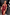 Thumbnail for Black Cherry Plunge Suit and matching wrap skirt with an all-over red cherry print and tan tote bag.