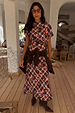 Chocolate brown Check Floral Lottie midi skirt with floral motifs, styled as a co-ord with a matching top and boots.