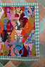 Circus Bandana featuring a multicoloured alphabet motif print and a teal checkered border for multi-wear styling.