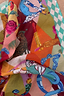 Thumbnail for Circus Bandana featuring a vibrant multicoloured alphabet print with leopard motifs and a teal chequered border.