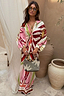 Thumbnail for Multicoloured Cirque Toria Dress with a sun motif and tie bust, designed in London for feel good dressing.