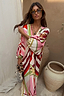 Multicoloured Cirque Toria Dress with a hand-painted sun print, balloon sleeves and a relaxed, vacation-ready fit.