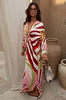 Multicoloured Cirque Toria Dress featuring a hand-painted sun print, multi-wear tie bust and relaxed sleeves.