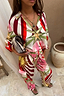 Thumbnail for Cirque Cargo Naomi Trouser and matching shirt in a bold abstract sun and star print, designed in London.
