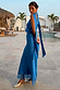Cobalt Maeva Midi Skirt with an intricate lace hem and matching top, styled in a poolside vacation setting.