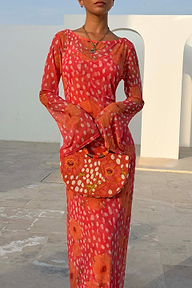 Coral Fawn Beaded Bag with poppy and deer glass bead embroidery and wooden handle, paired with a matching dress.