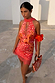 Coral Fawn Poppy Lily Top featuring poppy motifs, deer print and lace trim, styled as a vibrant coral co-ord.