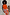 Thumbnail for Hot Coral Ribbed Tank in coral orange with a floral wrap skirt, shown on a size UK 18 model for inclusive sizing.