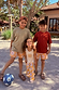 Girl's Yellow Sun Cotton Set with a cream sequin vest and soleil sun print trousers on vacation.