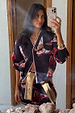 Navy Cowboy Boots Cardigan with red cowgirl motifs and pink trims, styled with a matching skirt in a mirror selfie.