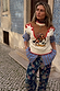 Cream Cowgirl Ro Knitted Tank featuring an embroidered cowgirl motif, red contrast stitching and padded shoulders.