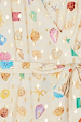 Cream Shell Mini Wrap Dress detail with colourful seashell motifs, gold foil spots and a wrap tie fastening.