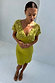 Green Shell Mini Elodie Dress in lime featuring a crochet knit bodice with gold charms and a satin mini skirt.