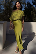 Green Shell Crochet Tilly Dress featuring shell embellishment on a knit top and a satin midaxi skirt.