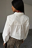 White Cropped Cotton Miley Shirt featuring an embroidered back neck logo and slight blouson sleeves.