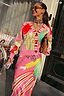 Thumbnail for Pink Dallas Cardigan featuring abstract cowboy motifs and a striped button stand, styled with a matching patterned skirt.