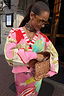 Pink Dallas Cardigan with abstract cowgirl motifs and stripe details, paired with a matching printed skirt.