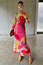 Pink Dallas Mesh Dress with abstract cowboy motifs, long sleeves and a midaxi length, shown in a mirror selfie.