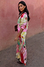 Thumbnail for Pink Dallas Dorris Skirt featuring an in-house abstract cowboy print, styled with a matching cardigan.