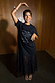 Black Dance Sequin Cara T Shirt Dress with a slogan sequin graphic and lace skirt insert, shown on a model.