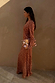 Fawn Soho Dress in brown and cream spotted deer print with flared long sleeves and a maxi silhouette.