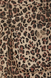 Leopard Lucia Shorts detail featuring brown leopard print denim, a scalloped pocket, and an embroidered logo.