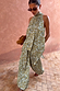 Green Diamond Print Halter Top in olive satin with a draped silhouette, styled with co-ord trousers and sunglasses.