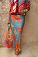 Blue Dolce Vita Dorris Skirt featuring sun and wave motifs in a satin-feel bias-cut silhouette.