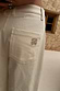 Ecru Raffia Palma Barrel Leg Jeans showing the brown embroidered NFD logo on the back pocket.