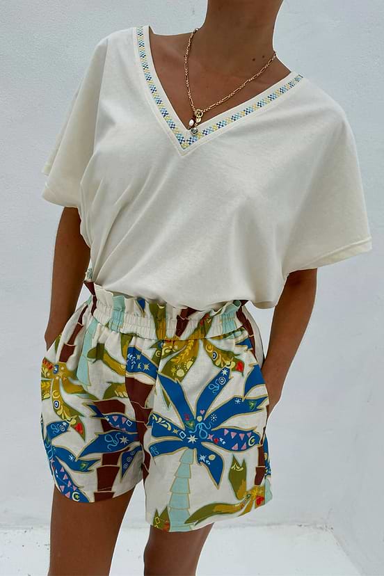Palm Elissa Shorts featuring a multi-coloured palm leaf print and a ruffled elasticated waistband in a cotton-linen blend.