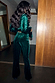 Emerald Velvet Trousers with diamond studs, shown from the back with a matching blazer.
