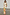 Thumbnail for Multi Enchanted Cardigan in cream with colourful motifs and multi-coloured trim, styled over a patterned maxi skirt.