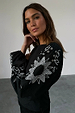 Black Enchanted Lillie Top featuring white Balearic inspired embroidery and blouson sleeves.