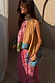 Etta Hankerchief Hem Top featuring multi-coloured block prints and sun motifs with a draped asymmetric hem.