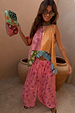 Etta Hankerchief Hem Top in a multi-colour sun print featuring a gathered neckline and asymmetric triangle hem.