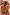 Thumbnail for Yellow Sun Swimsuit with sun-inspired print and frill trim, worn on a sunny beach vacation with family.