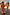 Thumbnail for Girl's Yellow Sun Swimsuit with frill trim and sun print, paired with a matching adult bikini on a beach vacation.
